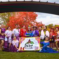 Mi Peru-MN members holding a banner